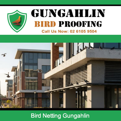 Bird netting installed on modern apartment building balconies preventing pest birds in Gungahlin