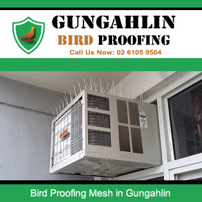Bird proofing mesh installed on air conditioning unit preventing pigeons from perching in Gungahlin